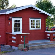 En röd stuga på Skerike Golfklubb. Foto: Pressbild